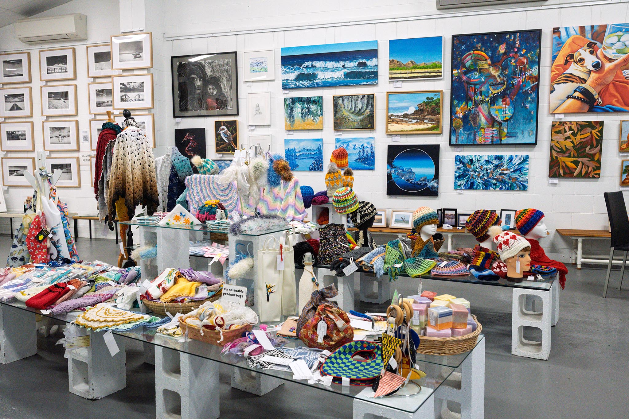 Textiles and artwork exhibited at the TAG Gallery.