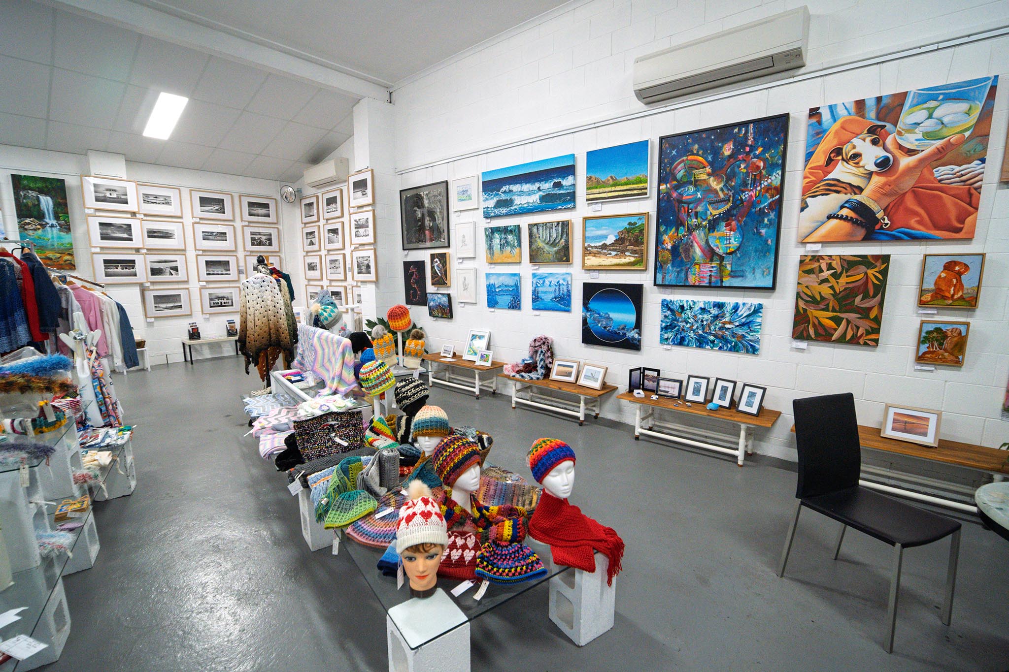 Visitors' view of artwork and crafts inside the TAG Gallery exhibition space.