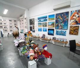 Visitors' view of artwork and crafts inside the TAG Gallery exhibition space.